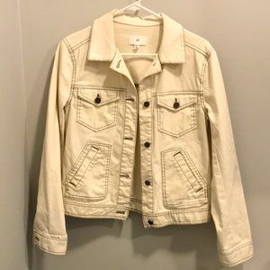 Cute and comfortable cream jean jacket.